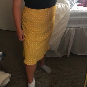 No One Cares yellow polka dotted skirt